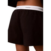Calvin Klein Schwarze Damen-Boxershorts aus Jersey-Baumwolle mit Logo und weißem elastischem Bund, die das Markenlogo tragen