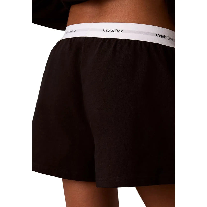 Calvin Klein Schwarze Damen-Boxershorts aus Jersey-Baumwolle mit Logo und weißem elastischem Bund, die das Markenlogo tragen