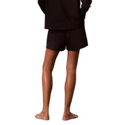 Calvin Klein Schwarze Damen-Shorts aus Jersey-Baumwolle mit Logo, weicher Textur, lockerer Passform und dezenten Seitennähten