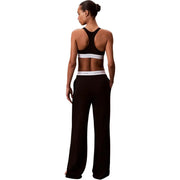 Schwarz Calvin Klein Damen-Jerseyhose aus Baumwolle mit weitem Bein und weißem elastischem Bund, der das Markenlogo trägt