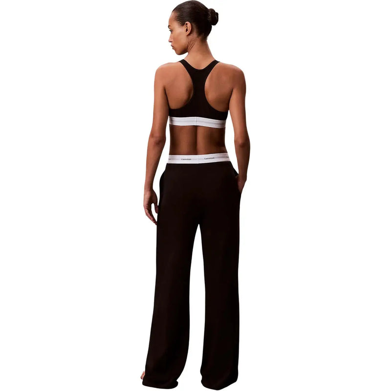 Schwarz Calvin Klein Damen-Jerseyhose aus Baumwolle mit weitem Bein und weißem elastischem Bund, der das Markenlogo trägt