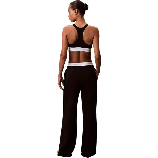 Schwarz Calvin Klein Damen-Jerseyhose aus Baumwolle mit weitem Bein und weißem elastischem Bund, der das Markenlogo trägt