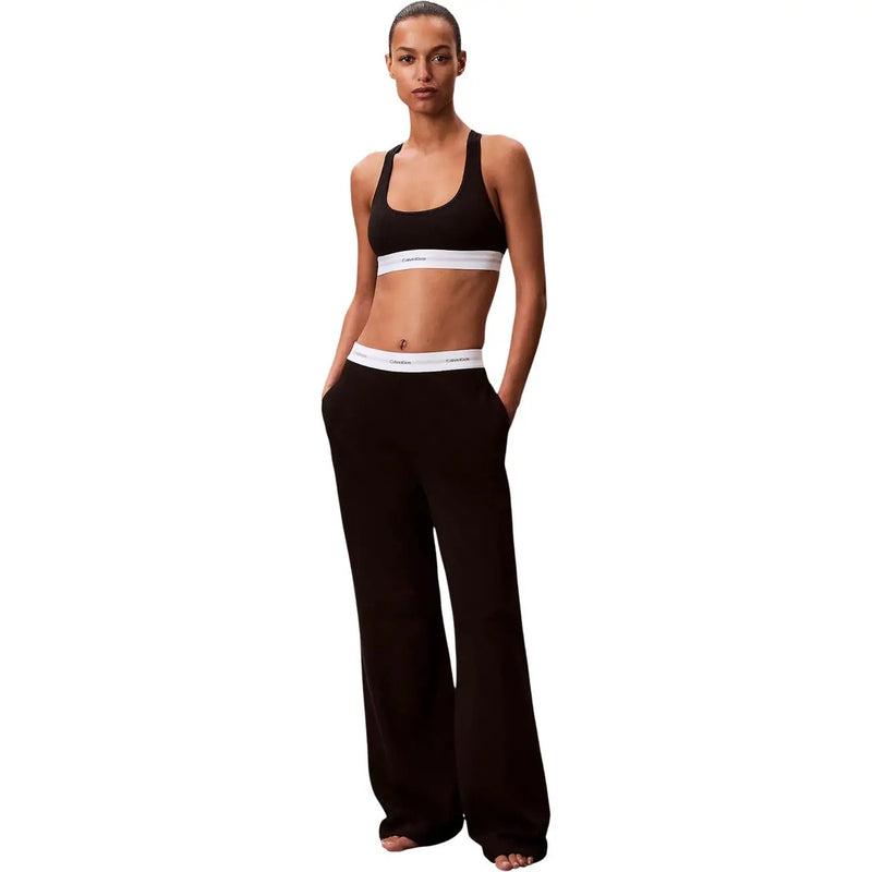 Schwarz Calvin Klein Damen-Jerseyhose aus Baumwolle mit weitem Bein und Logomuster sowie weißem Gummibund, auch als Unterwäsche geeignet