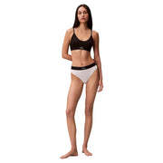 Calvin Klein Damenunterwäsche, schwarz-weißes Bikini-Set aus Polyester mit elegantem, minimalistischem Design und String-Schnitt