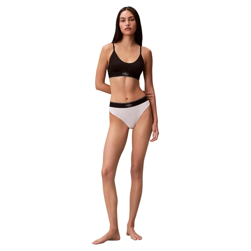 Calvin Klein Damenunterwäsche, schwarz-weißes Bikini-Set aus Polyester mit elegantem, minimalistischem Design und String-Schnitt