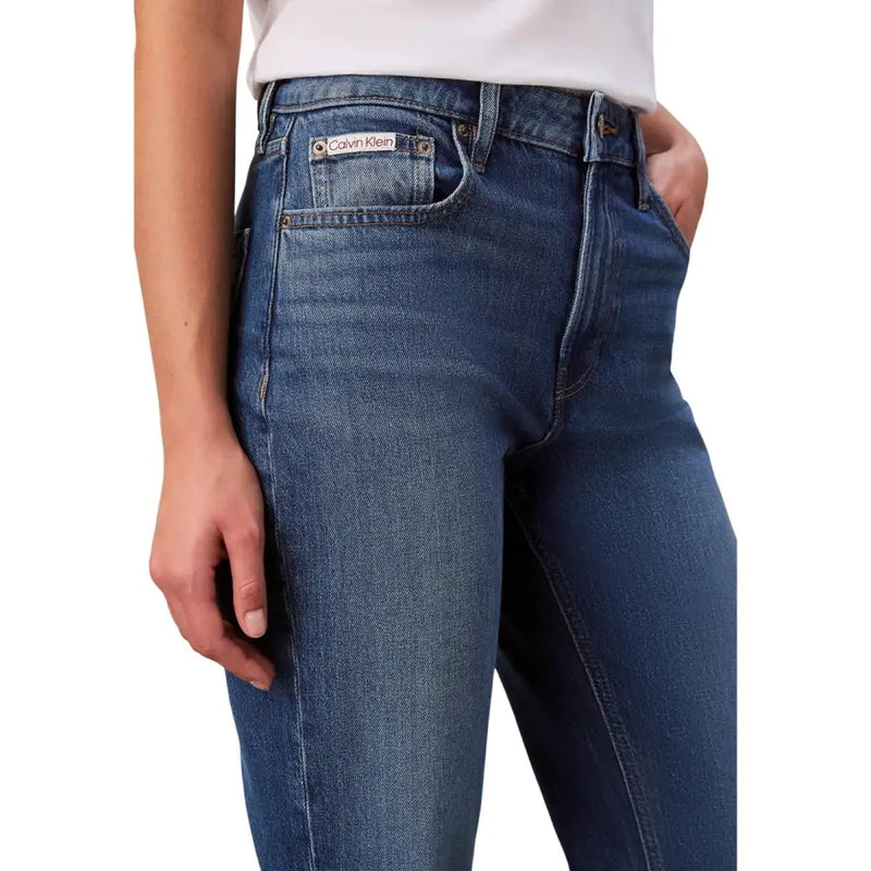 Dark blue cotton stretch calvin klein women’s jeans with classic fit shown from the back pocket side