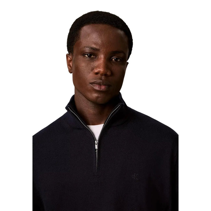 Calvin Klein Schwarzer Wollpullover für Herren mit Rippstrickmuster, halbem Reißverschluss und dezentem, gesticktem Logo, Vorderansicht