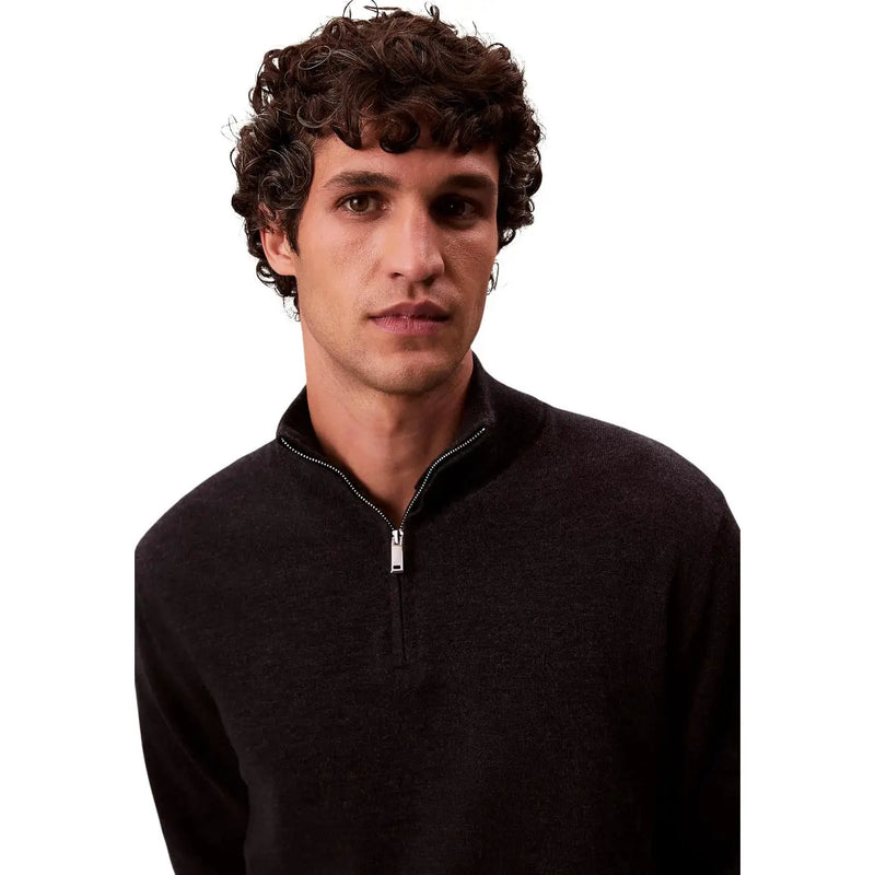 Calvin Klein Schwarzer Rollkragenpullover aus Merinowolle für Herren mit silbernem Halbreißverschluss, Vorderansicht