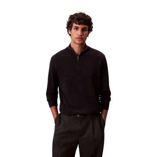 Calvin Klein Schwarzer Rollkragenpullover aus Merinowolle für Herren mit halbem Reißverschluss und gerippten Bündchen, Vorderansicht
