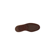 Brown rubber sole with textured tread and clarks logo embossed near the heel of clarks men lace up camel suede shoes