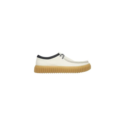 Clarks men lace ups shoes white leather slip on with black trim and tan rubber sole article 26187380