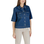 Classic blue short sleeve cotton shirt for women featuring a denim jacket style with silver buttons and front pockets