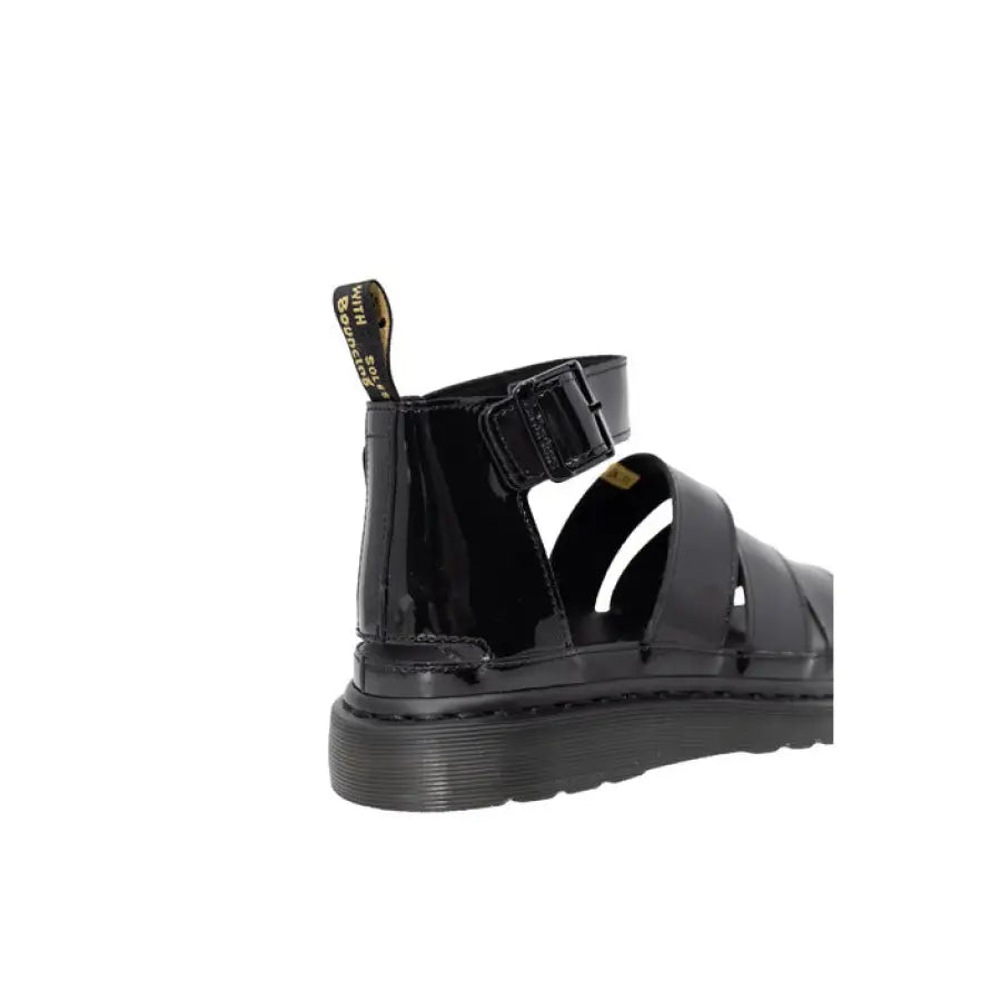
                      
                        Close-up of Dr. Martens women sandals, black with buckle
                      
                    