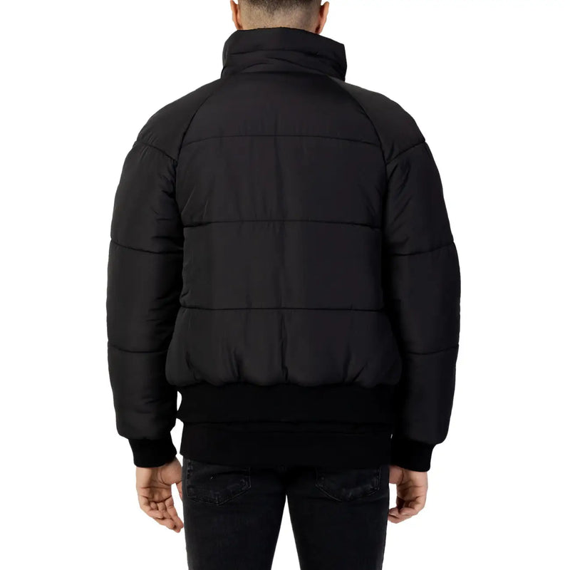 Cnc Costume National Schwarze, gesteppte Herren-Baumwolljacke mit hohem Kragen und gerippten Bündchen