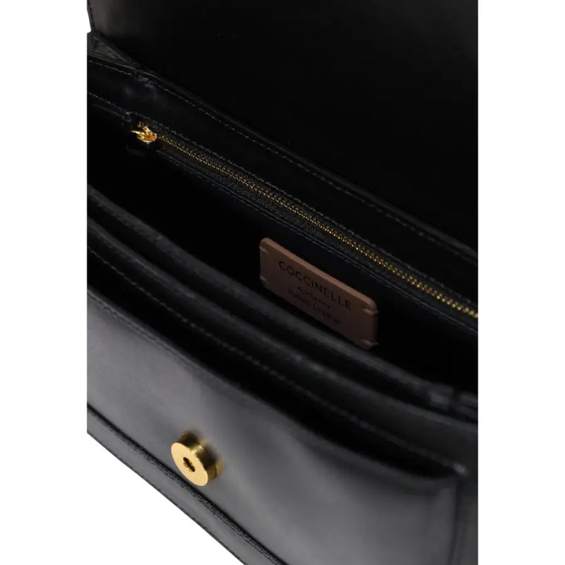 Black leather coccinelle handbag with gold-tone hardware branded label and inside pocket visible on front side