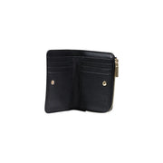 Coccinelle black leather zip wallet for women featuring textured leather with gold-tone zipper and hardware