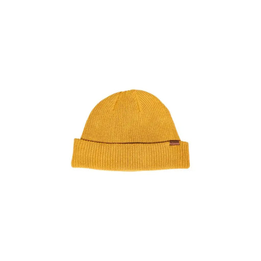 Mustard yellow ribbed beanie with folded cuff and brown leather tag.