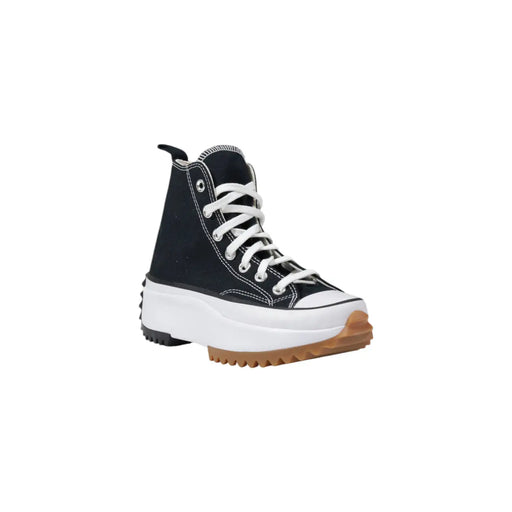 Converse Schwarze Damen-Plateau-Sneaker aus Obermaterial mit weißen Schnürsenkeln, dicker Zwischensohle und gummierter Außensohle (Seitenansicht)