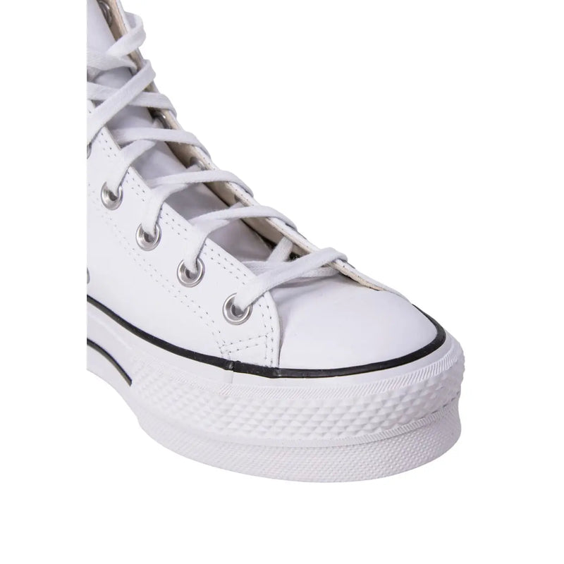 Converse women white polyurethane platform sneaker with white leather upper black rubber sole and classic branding
