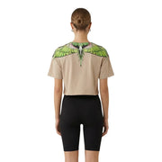 County of Milan Damen beige Baumwoll-Crop-Top mit kurzen Ärmeln top mit einer leuchtend grünen und weißen Flügelgrafik über den Schultern