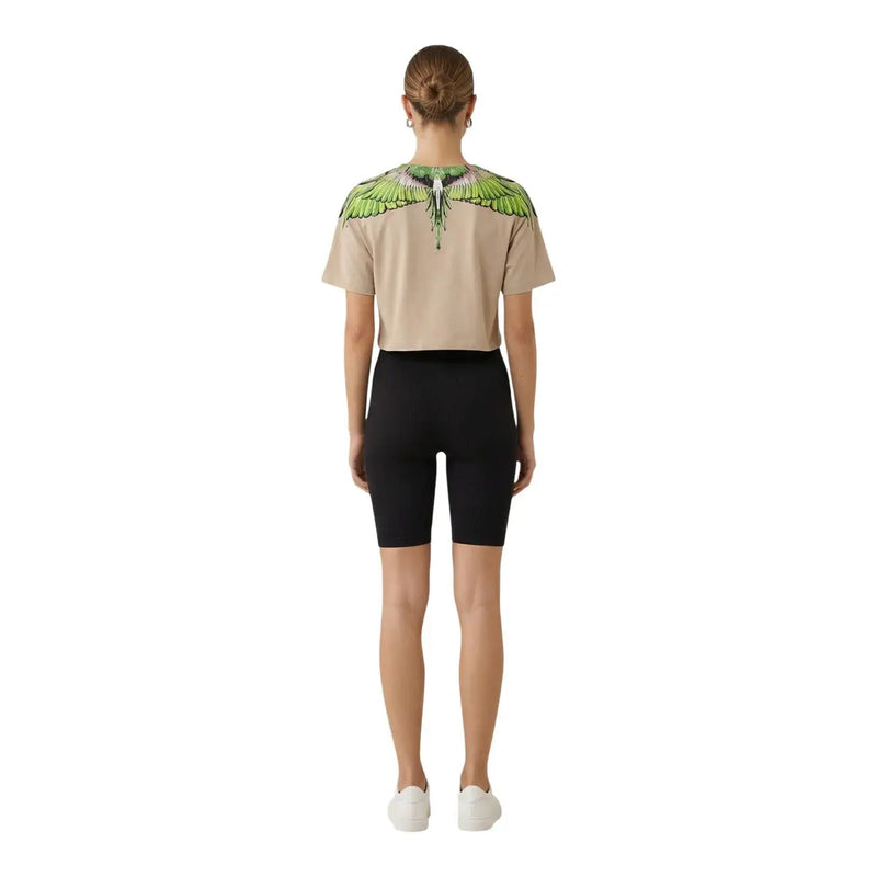 Damen-Bluse aus beigefarbenem Baumwollstoff mit Rundhalsausschnitt, County of Milan t-shirt mit einem leuchtend grünen und weißen Flügelmotiv über den Schultern