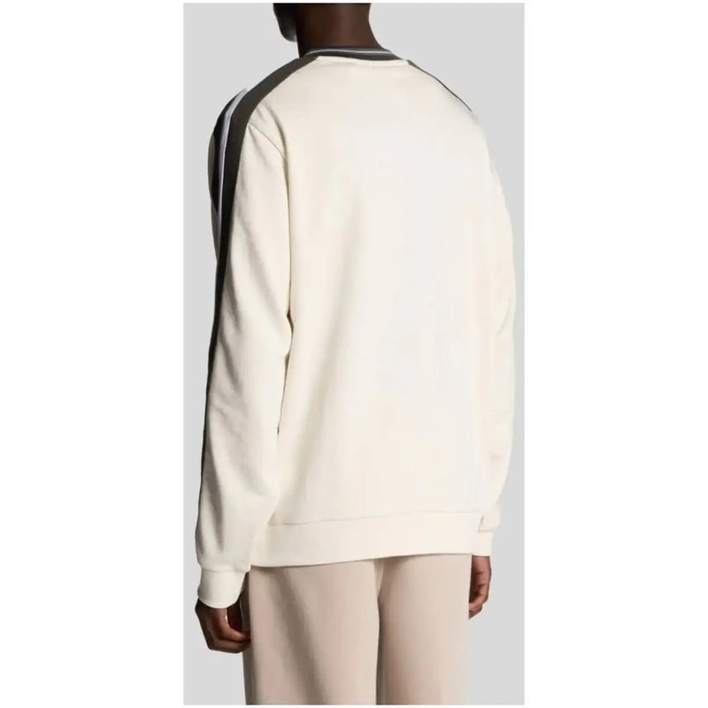 Cream-colored sweatshirt with black and white striped shoulder panels from cream and beige sweatshirts with contrasting details