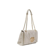 Cream-colored quilted handbag with gold chain straps for elegant style