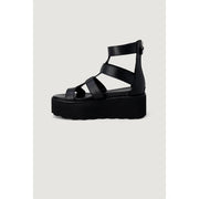 Black leather platform slip on sandal with multiple straps and zipper closure for women by Cult