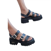 Black leather platform sandals with silver buckle straps and chunky textured sole from Cult Women collection