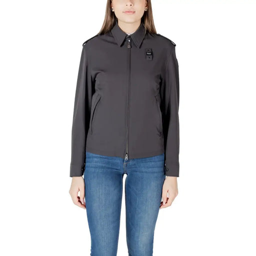 Dark gray collared jacket with sleek zip front structured shoulders and subtle brand patch on the chest