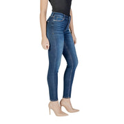 Dark wash skinny denim jeans in blue with slim fit and classic five-pocket design made of denim material