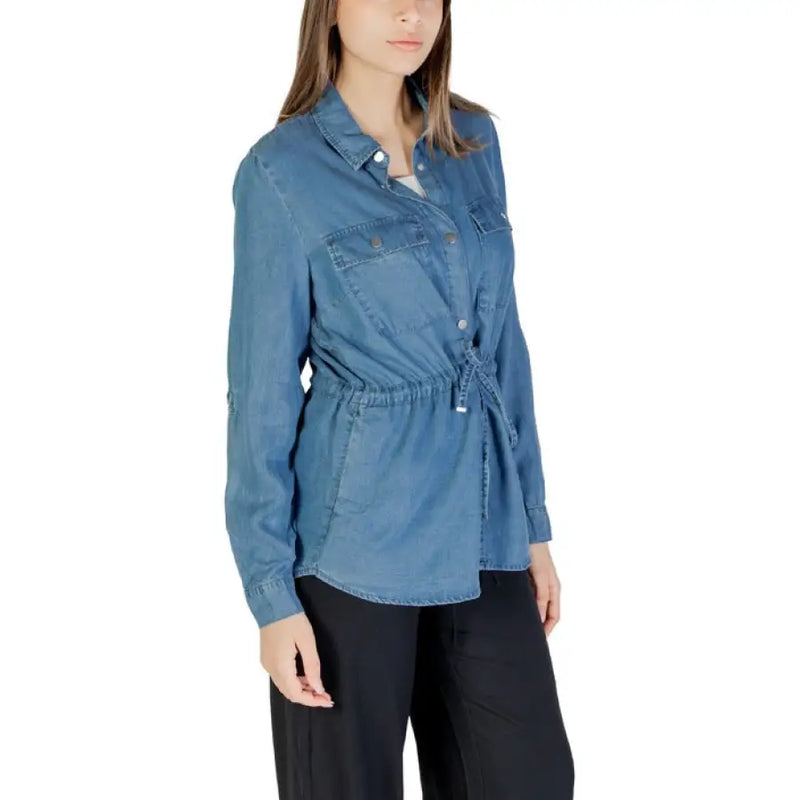 Blue Denim Drawstring Shirt displayed in a stylish fashion setting