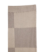 Beige and taupe ribbed knit sock with vertical striped pattern paired with Desigual beige checked women skirt spring summer