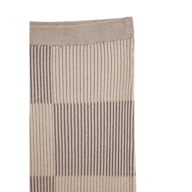 Beige and taupe ribbed knit sock with vertical striped pattern paired with Desigual beige checked women skirt spring summer