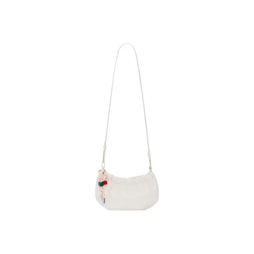 Desigual beige polyester shoulder bag with a plush off-white texture, slender white strap, and decorative red green keychain