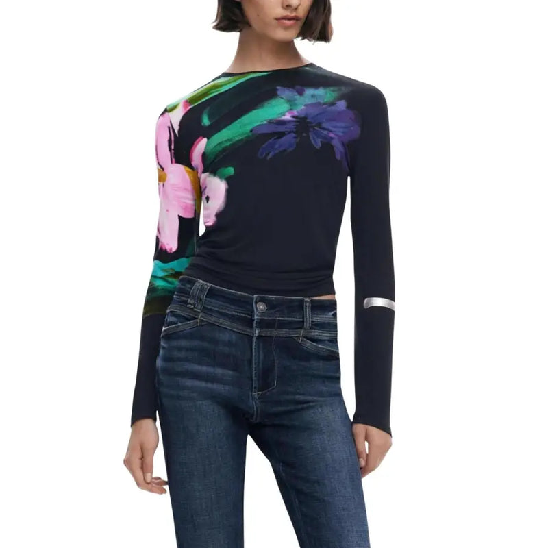 Black floral long-sleeved knitwear with round neck paired with dark wash jeans for women