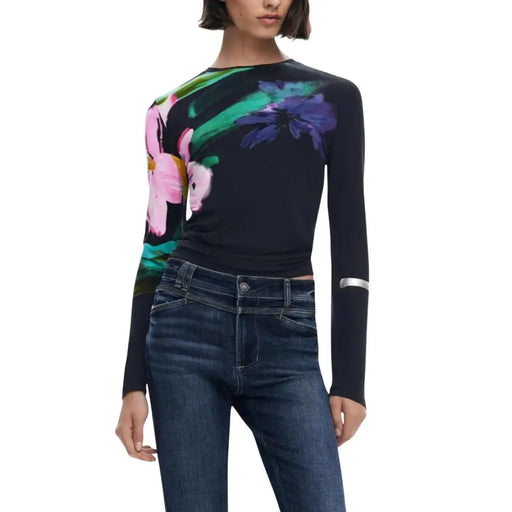 Black floral long-sleeved knitwear with round neck paired with dark wash jeans for women