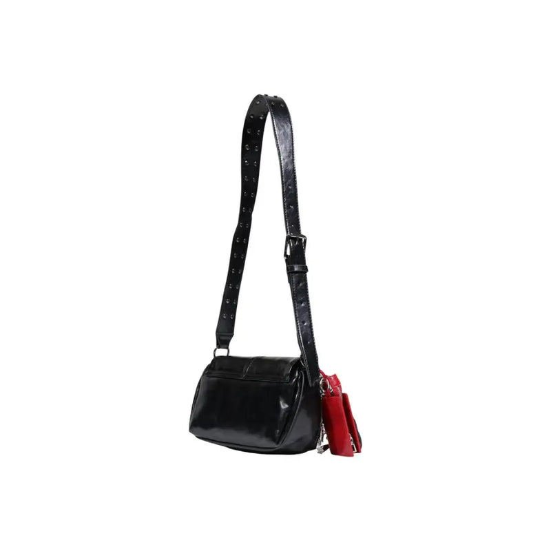 Desigual black glossy leather crossbody bag with studded strap and red tassel accent featuring an inside pocket