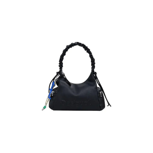 Black nylon shoulder bag with ruched strap and colorful keychains from Desigual