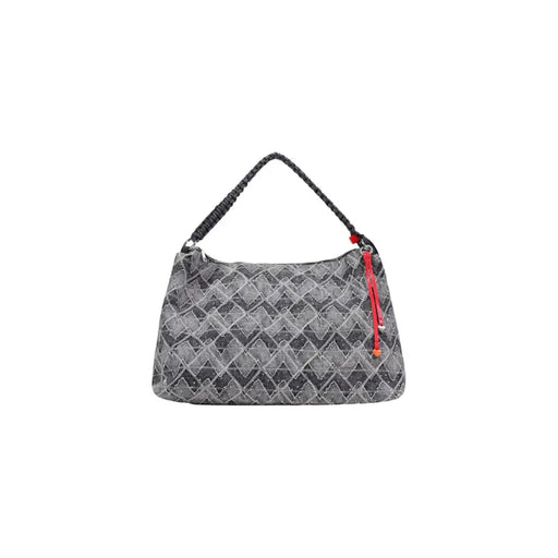 Desigual blue geometric cotton handbag with gray zigzag pattern, braided black handle, and red tassel accent