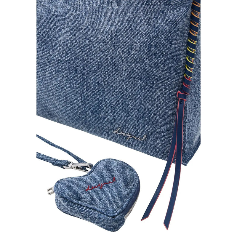 Denim-textured heart-shaped coin purse with red embroidery and silver zipper featured in desigual blue handbag with shoulder strap and pockets