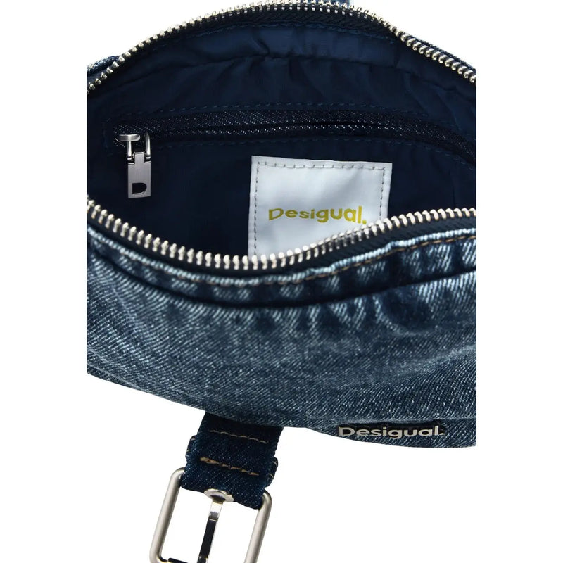 Denim blue Desigual crossbody handbag with silver zipper and buckle featuring shoulder strap and zip pocket