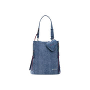 Denim blue Desigual zippered bucket bag with heart-shaped charm and colorful braided accents with pockets