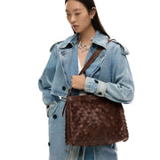 Desigual brown polyester handbag with structured woven leather texture and subtle embossed brand name on the front
