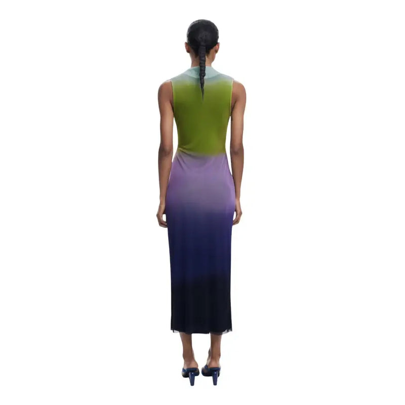 Woman wearing a Desigual purple sleeveless ombre midi dress with a round neckline