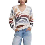 Women’s V-neck sweater with abstract zebra print in white, blue, brown, and black