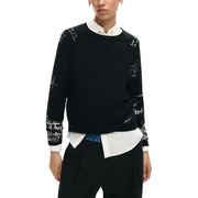 Beigefarbener Desigual-Strickpullover mit Print und langen Ärmeln sowie schwarzen Schriftzügen