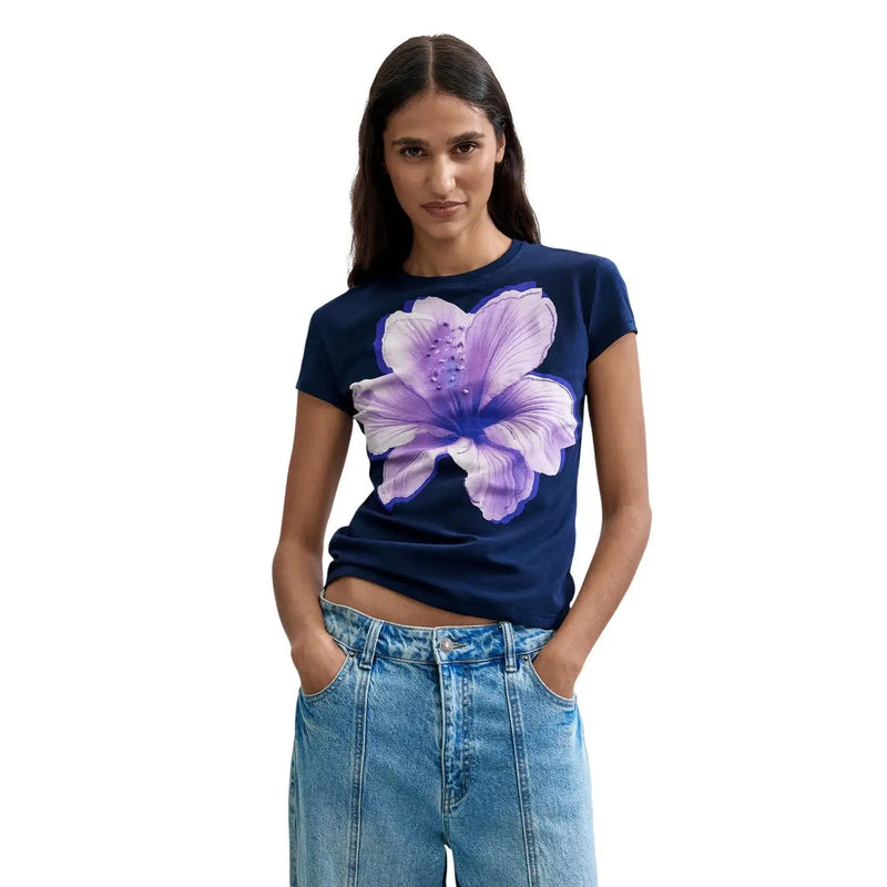 Desigual women blue cotton short sleeve t shirt with round neck and vibrant purple hibiscus flower graphic