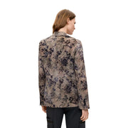 A woman wears a desigual women floral beige polyester blazer with long sleeves and elegant muted floral pattern