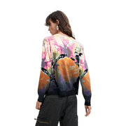 Ein farbenfroher, langärmeliger Desigual Damen-Strickpullover aus Kaschmir-Baumwolle mit floralem Muster in Rosa, Orange, Lila und Schwarz.